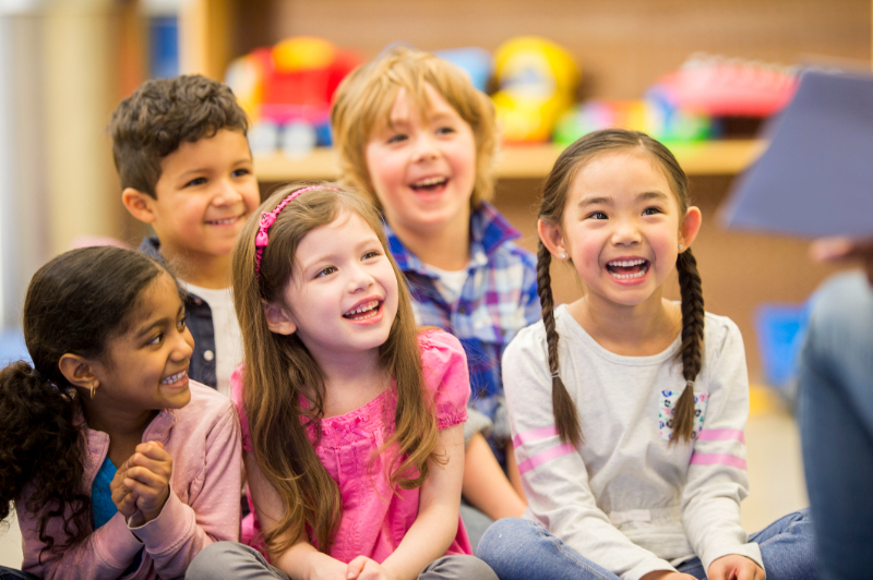 kids happy listening to their teacher